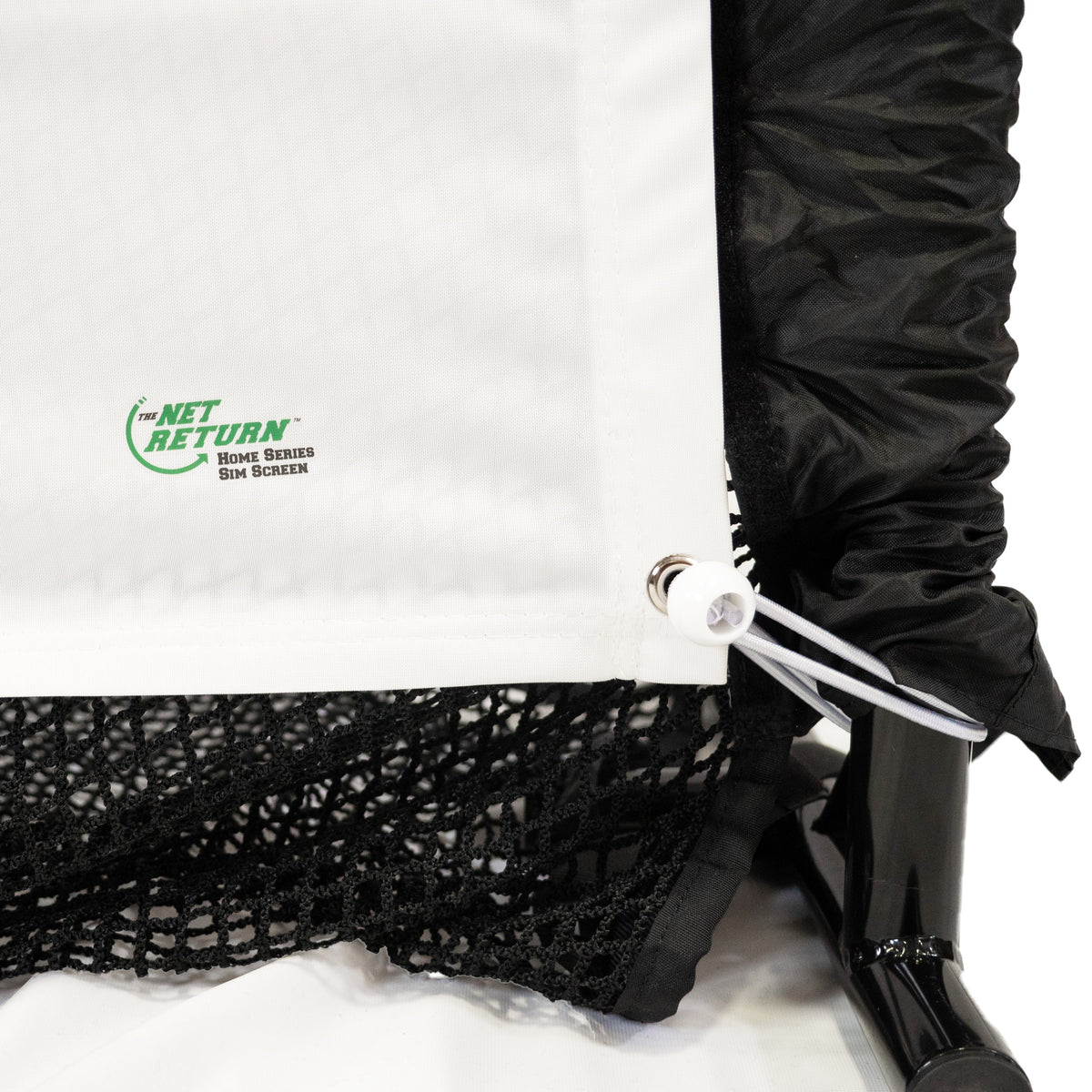 Close-up of The Net Return's Simulator Screen, featuring white netting with a logo, black trim, and an attached cord. This high-impact screen has edge plastic hooks and is perfect for golf simulators with ball return mode.