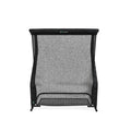 Black indoor golf hitting net with a sturdy frame, featuring a mesh design for practice and training.