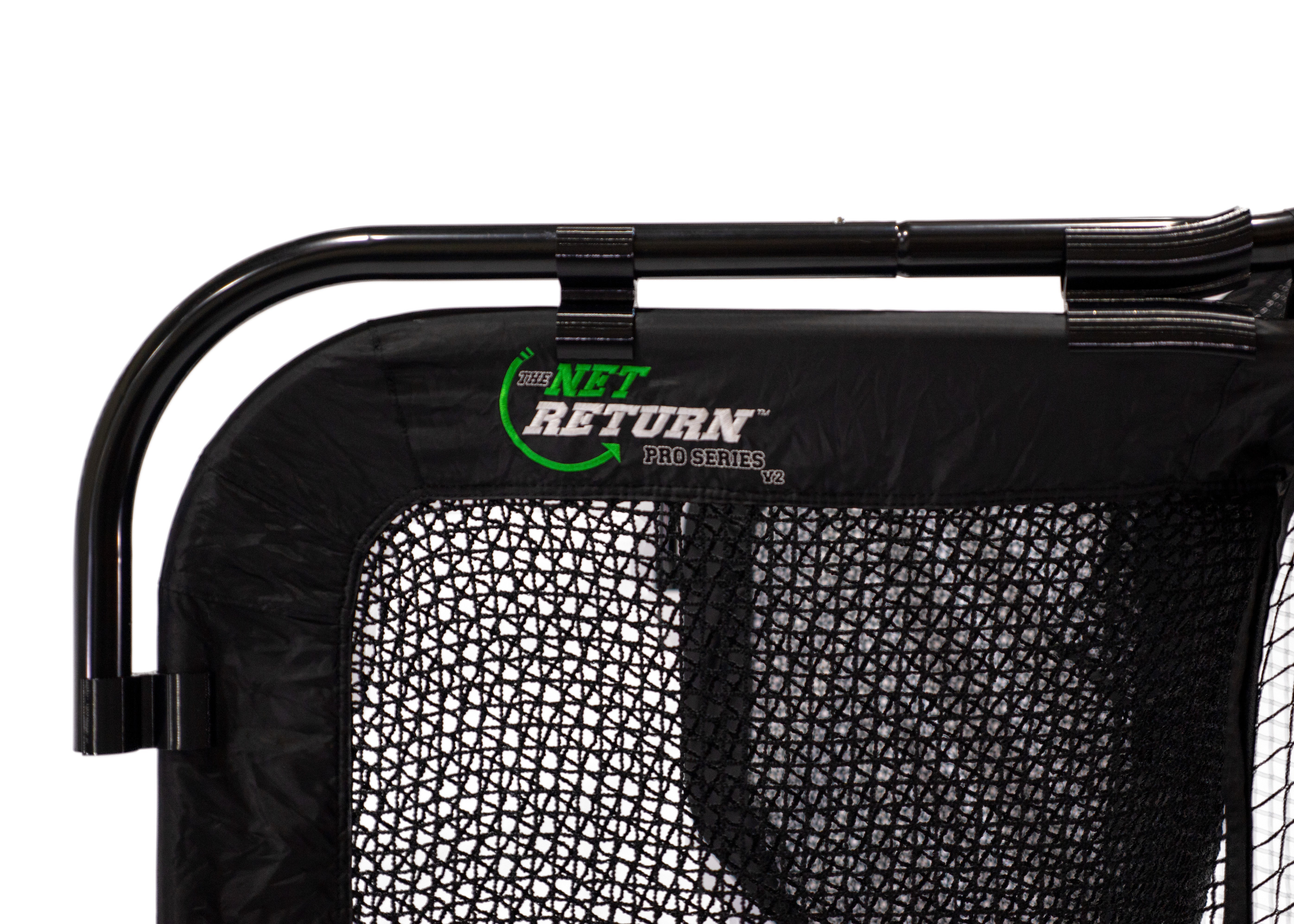 Close-up of the top corner of a black net with "The Net Return" branding, showing the No Fly Zone V2 Accessory, designed for added overhead protection in golf net setups or simulator enclosures.