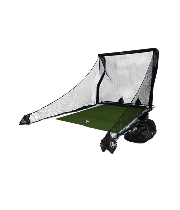 Golf practice net setup with a green mat and two golf balls on the mat.
